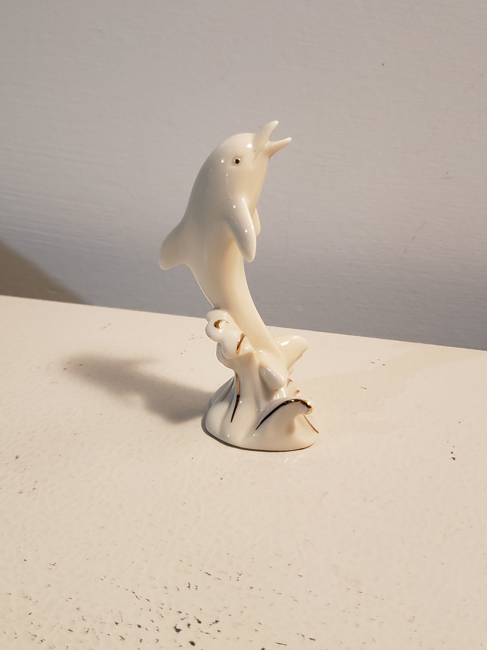 Others Follow White Porcelain Dolphin Figurine with Gold Trim